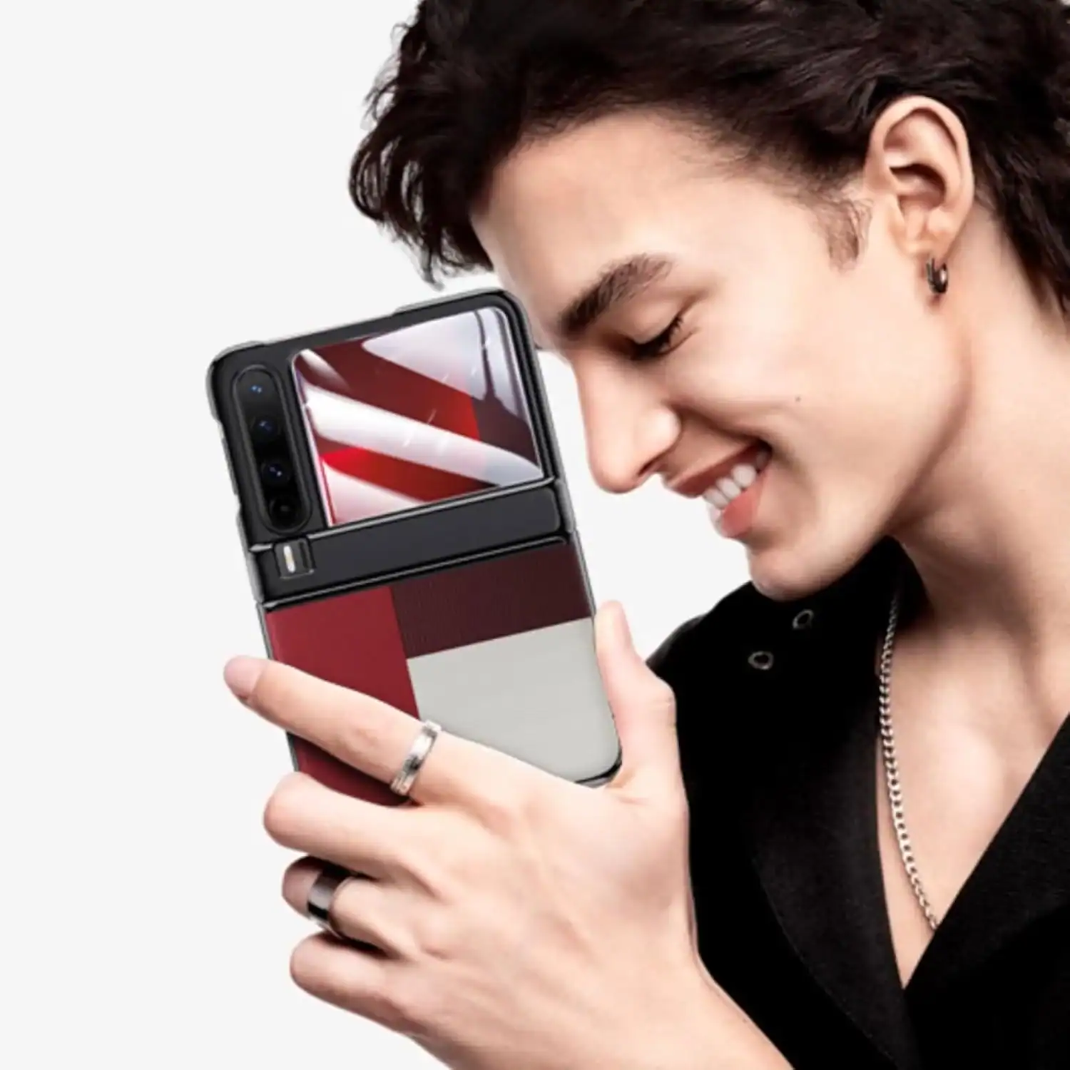 F1.jpg, A young woman smiling while holding a stylish foldable smartphone with a unique red and white design, showcasing innovative mobile technology. , A young woman enjoys using a modern foldable smartphone with a striking red and white color scheme, highlighting the latest in mobile device design and features. This image emphasizes the integration of aesthetics and technology, perfect for promoting XYUltra's advanced smartphones and cutting-edge features. , Relevant to mobile innovation, foldable smartphones, trendy gadgets, and the XYUltra brand focusing on modern tech solutions.