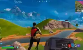 A Player In Fortnite Game Exploring Lush Green Hills And Mountains, Showcasing Vibrant Graphics And Landscape, With A Focus On Gameplay, Adventure, And Immersive Environment For Gaming SEO.